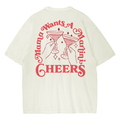 White t-shirt with red graphic and text 'Mama Wants A Martini's Cheers' on a white background