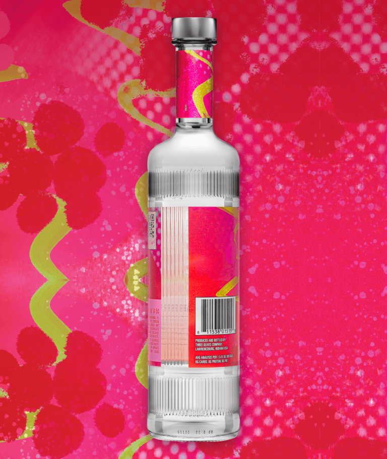 Three olives raspberry bottle side view